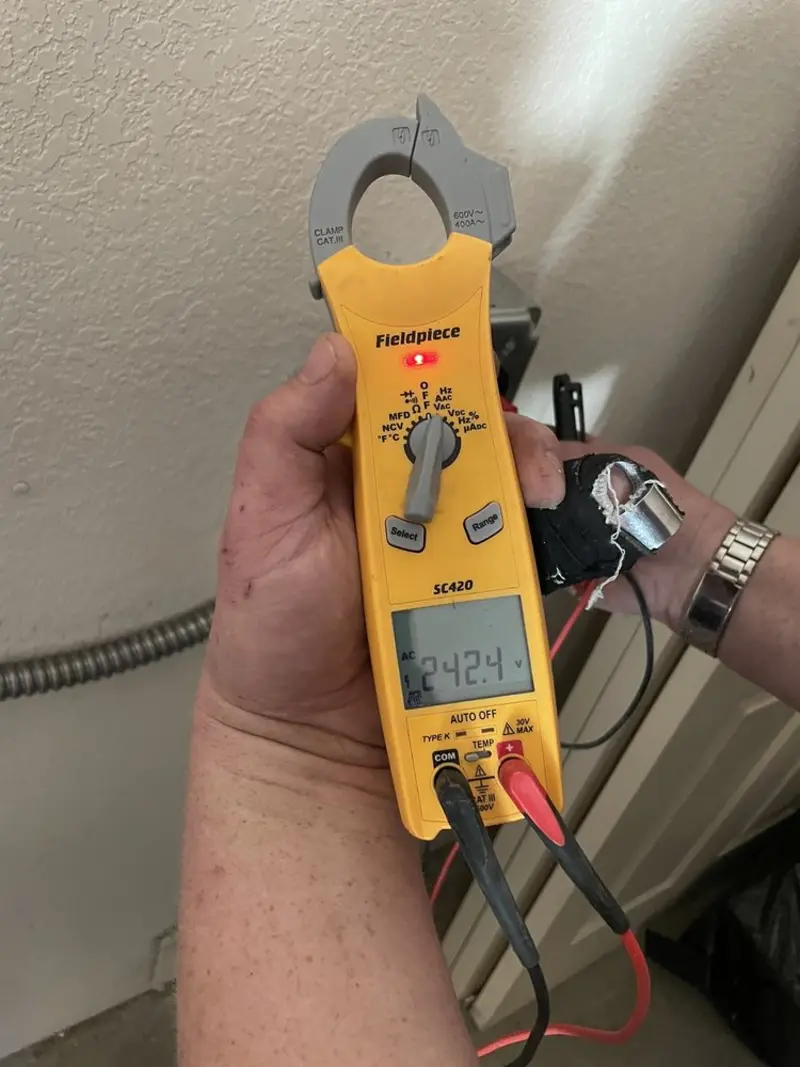 Voltage testing with clamp meter during Circuit Breaker Repair in Josephine